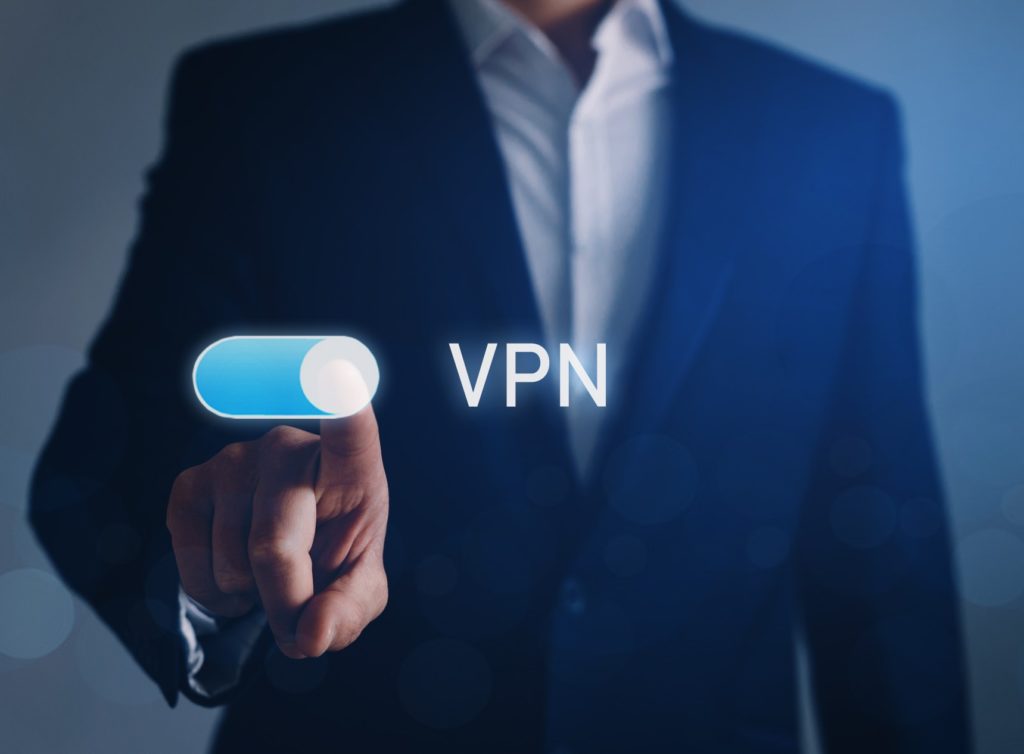 Man enabling VPN for secure communications.