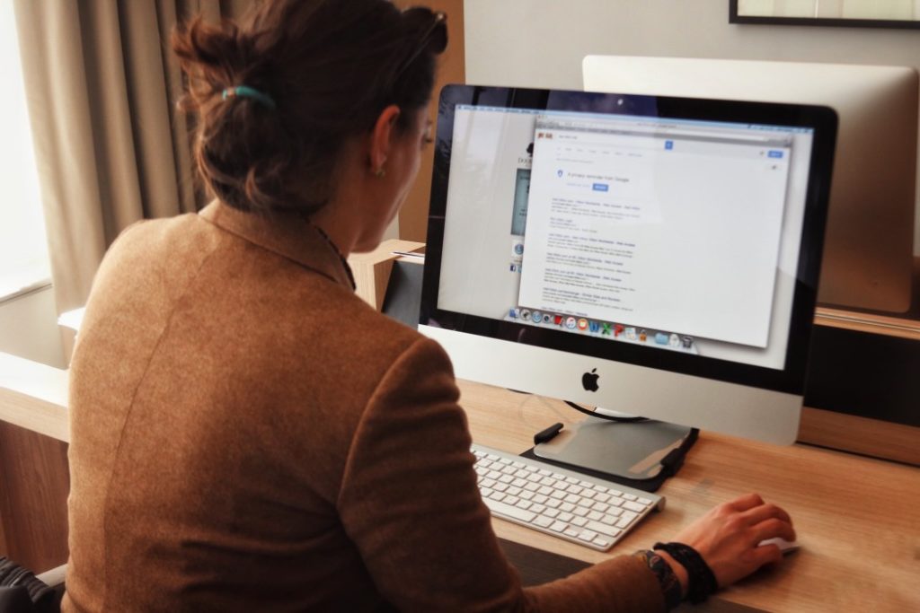 Woman checking latest email message.